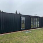 40ft High Cube Custom Container Home – Modern Black One-Trip ISO Modular Living Unit